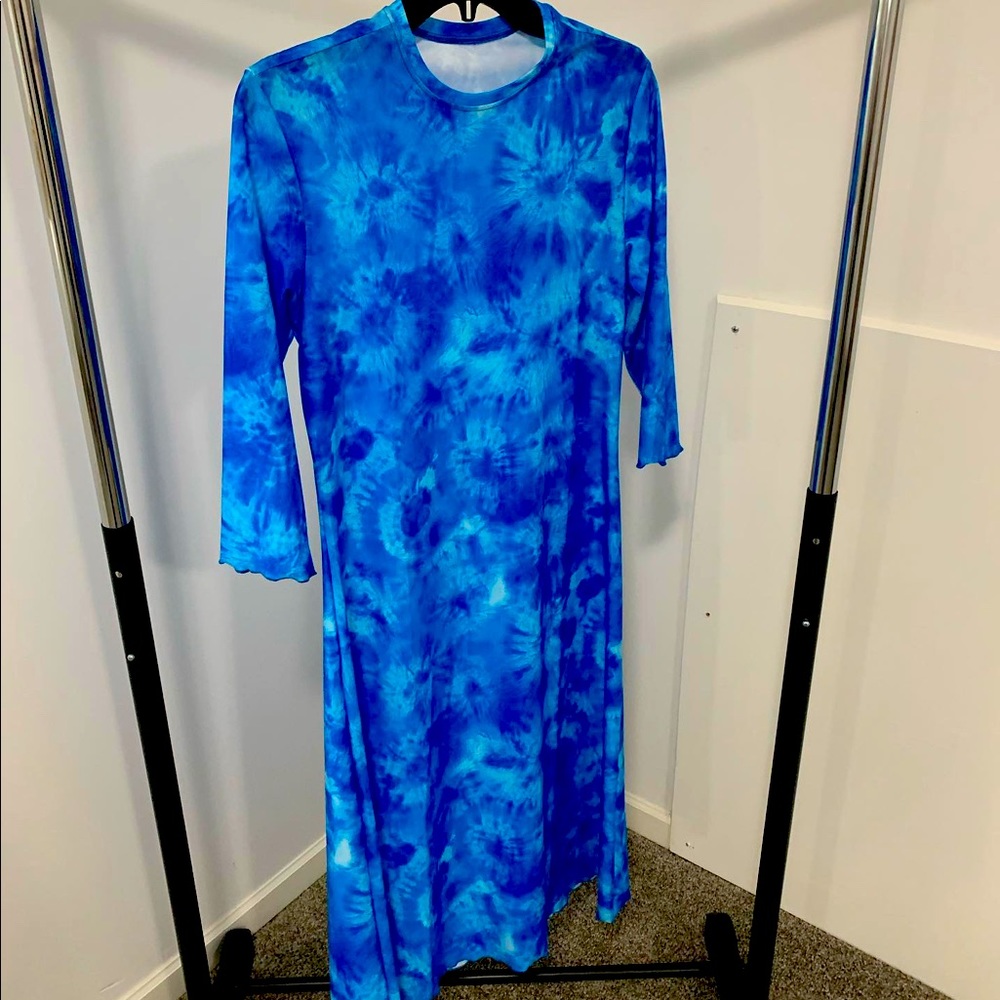 Size medium midi length swim dress. NWOT.